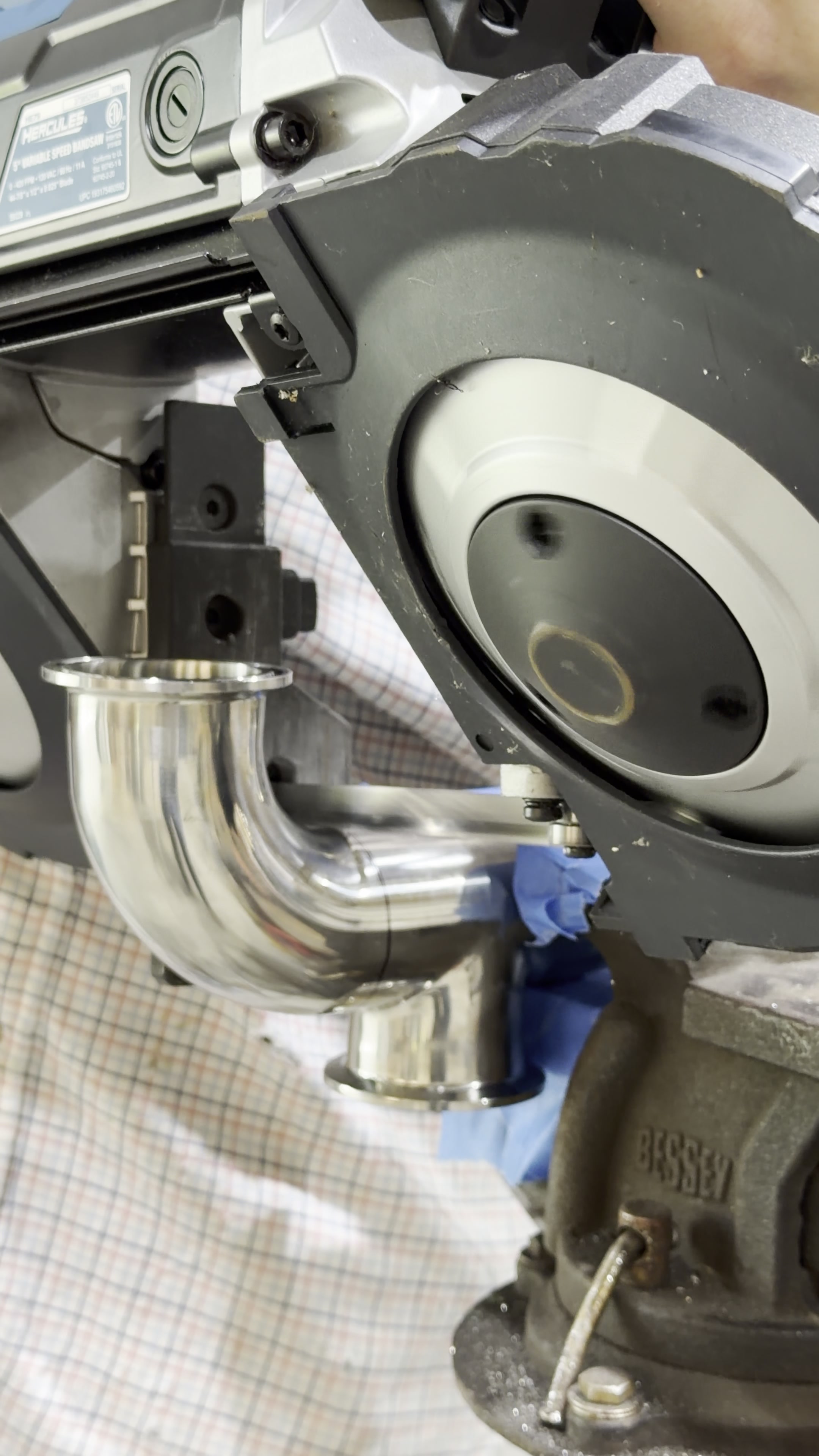 Cutting stainless sanitary T-fitting on band saw
