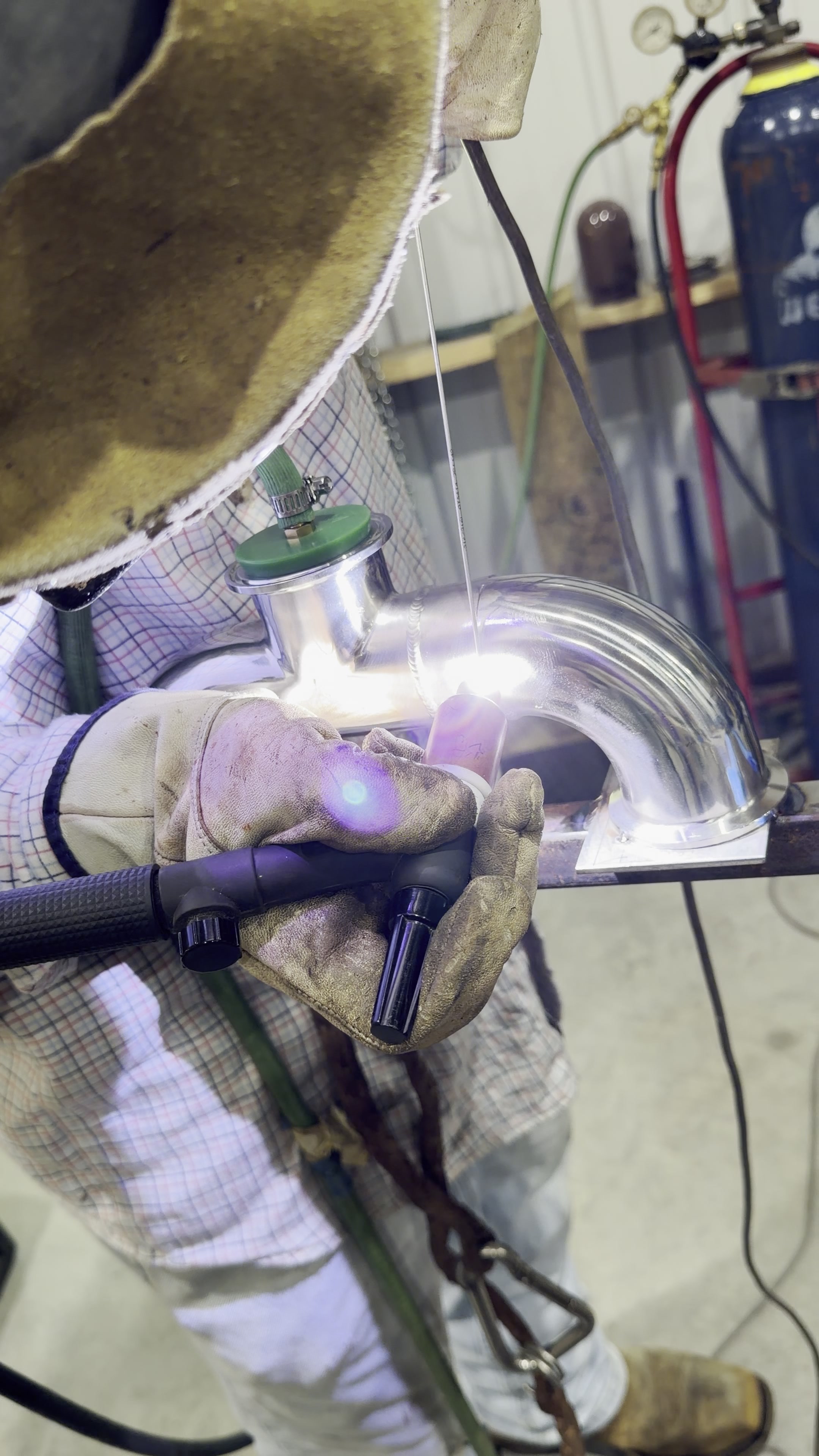 Close-up of GTAW arc on stainless T-fitting